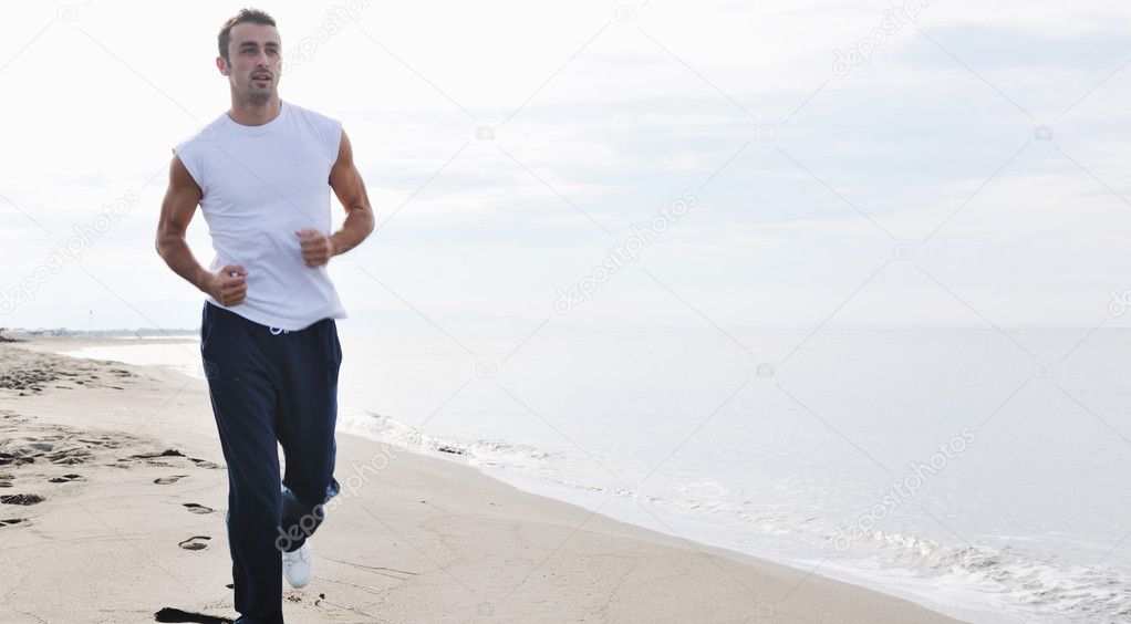 Man running on beach