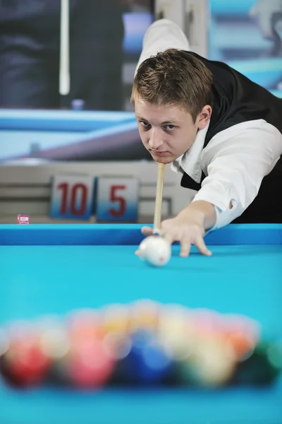 stock image Young man play pro billiard game