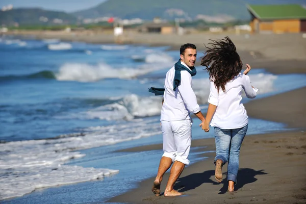 Happy young couple have fun at beautiful beach Royalty Free Stock Images