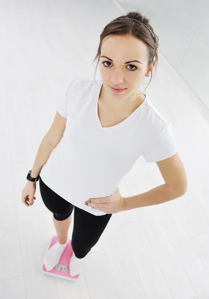 Woman workout in fitness club on running track — Stock Photo, Image