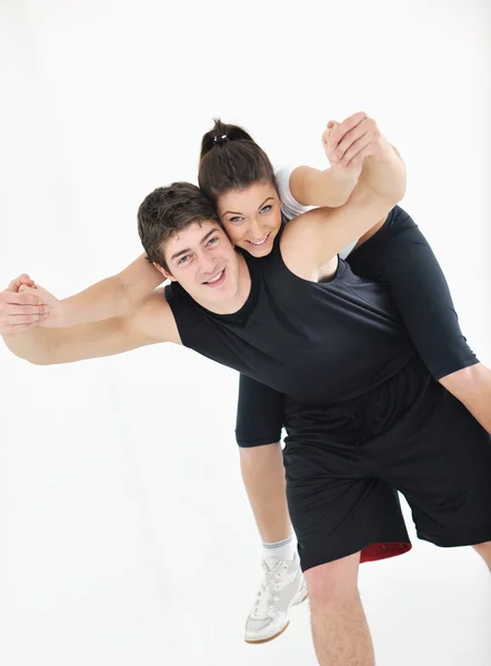 Feliz jovem casal fitness treino e diversão — Fotografia de Stock