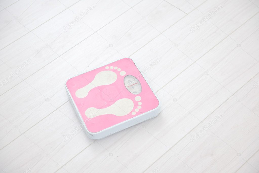 Pink scale weight object for diet and healthy life concept
