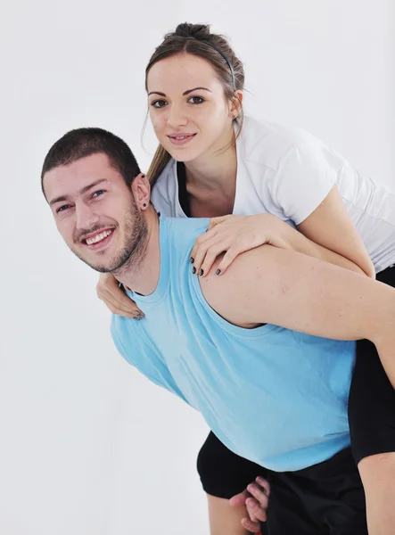 Trening fitness szczęśliwa para młoda i zabawa — Zdjęcie stockowe