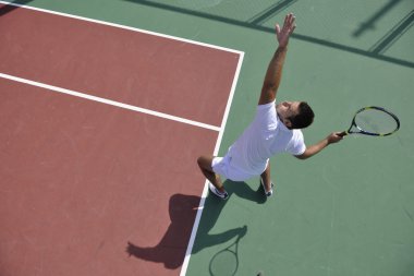 Young man play tennis clipart