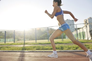 Woman jogging at early morning clipart