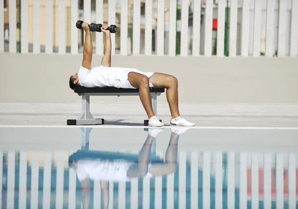 Young Healthy Athlete Man Exercise Poolside — Stock Photo, Image