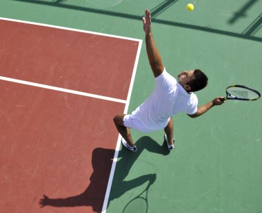 Young man play tennis outdoor clipart