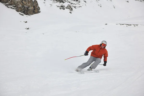Skiing on on now at winter season — Stock Photo, Image