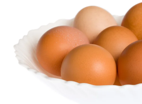 Ägg på vit platta — Stockfoto