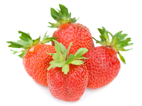 Four ripe strawberries — Stock Photo, Image