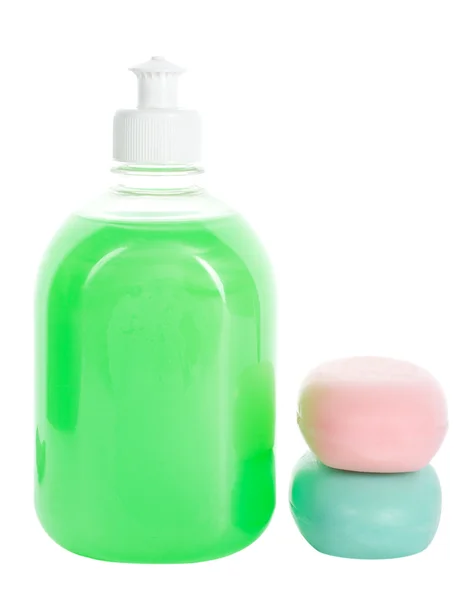 Liquid soap and two bars of toilet soap — Stock Photo, Image