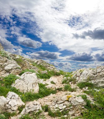 Clouds above mountain clipart