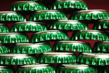 Pile of green beer caps clipart