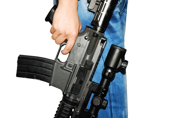 Young girl with gun in hand — Stock Photo, Image
