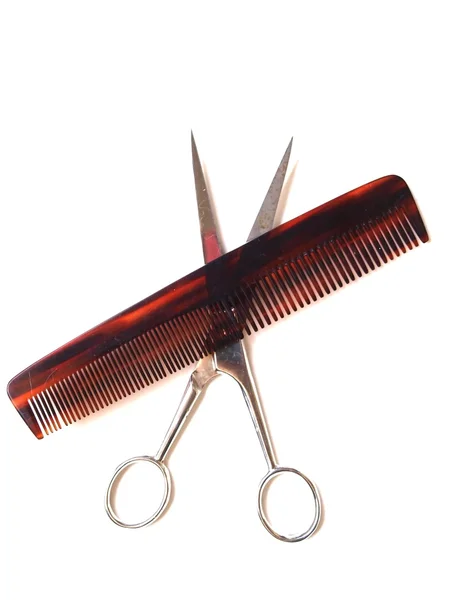 Scissors and comb on white background — Stock Photo, Image