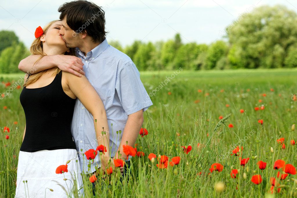 Loving couple sharing a pasionate kiss