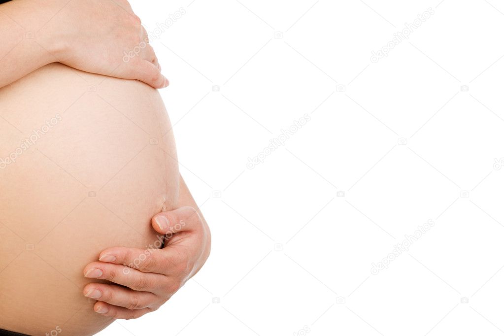 Mid section closeup of a pregnant woman