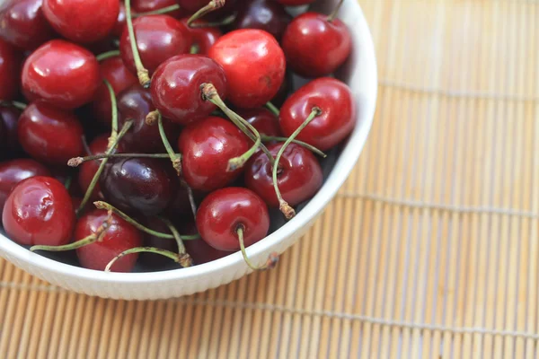 A bowl filled with fresh cherries — Stock Photo, Image