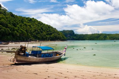 Boat on the beach clipart