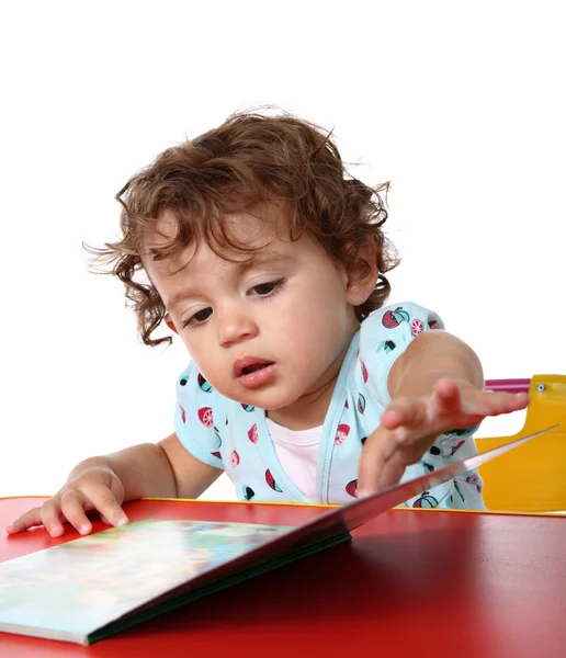 Bébé fille avec livre — Photo