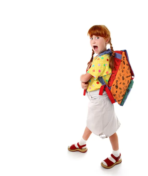 Trochu legrační školačka s batohem — Stock fotografie