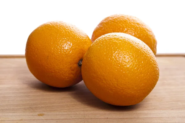 Апельсин на белом фоне Стоковая Картинка