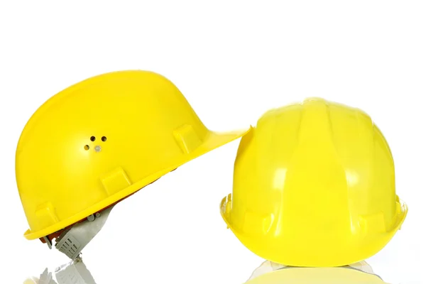 Два желтых шлема — стоковое фото