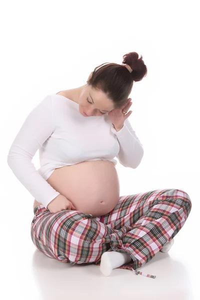 Έγκυος γυναίκα ακούει — Φωτογραφία Αρχείου