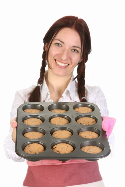 Vacker hemmafru visar upp kakor — Stockfoto