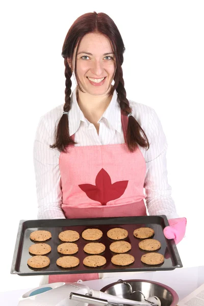 Prachtige huisvrouw pronken gebak — Stockfoto