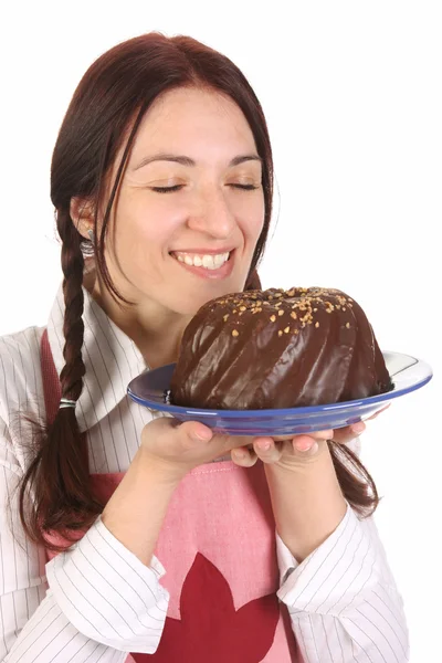 Hausfrau mit Bündel Kuchen — Stockfoto