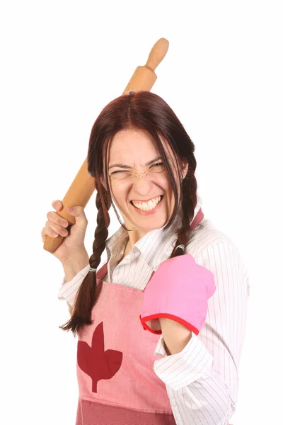 Femme au foyer folle avec un rouleau à pâtisserie — Photo