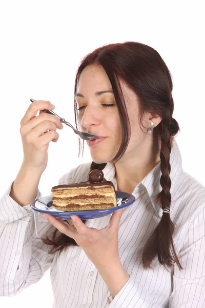 Bella donna mangiare pezzo di torta — Foto Stock
