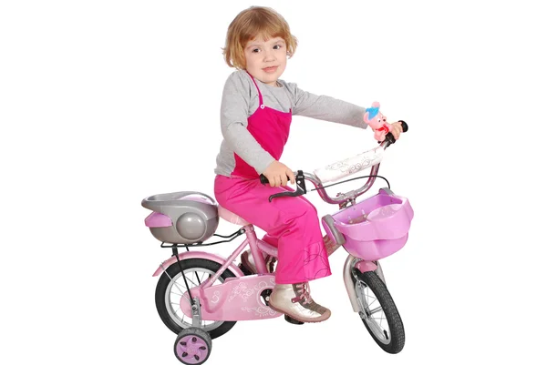 Маленька дівчинка з велосипедом — стокове фото