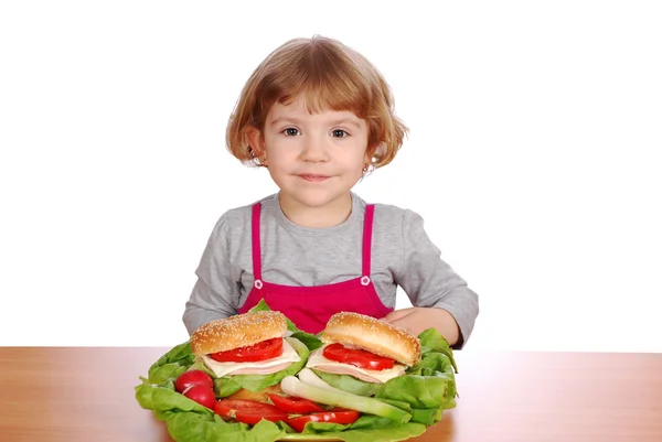Little girl with sandwiches and vegetabl — Stock Photo, Image