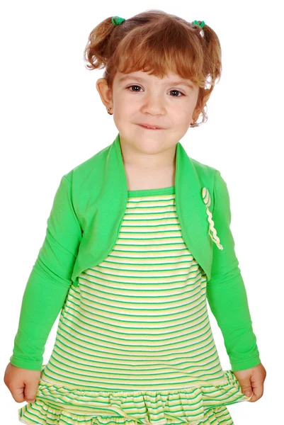 Malá holčička v žluté zelené šaty pózuje — Stock fotografie
