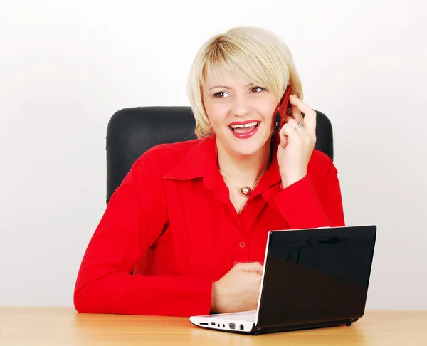 Business woman with phone and laptop — Stock Photo, Image