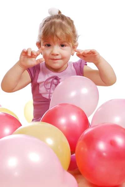 Petite fille avec des ballons colorés — Photo