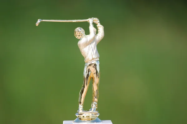 Golf speler gouden standbeeld — Stockfoto