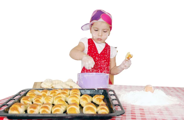 Little girl make rolls with flour — Stock Photo, Image