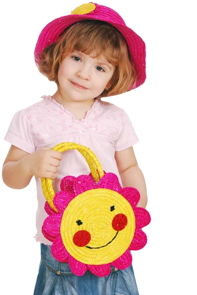 Menina com chapéu de palha vermelho e saco — Fotografia de Stock