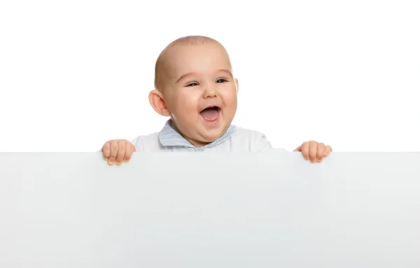 Lindo bebé niño sosteniendo vacío tablero en blanco — Foto de Stock