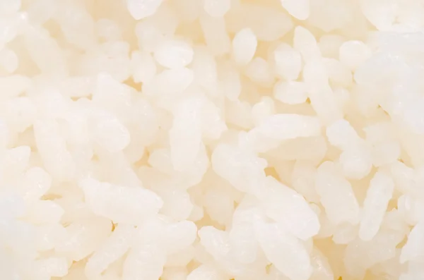 Gekochter Reis als Hintergrund — Stockfoto
