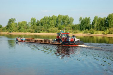 A barge on a river clipart