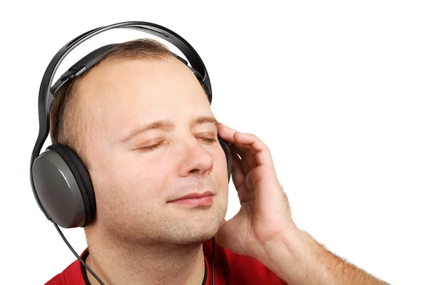 Hombre joven en auriculares — Foto de Stock