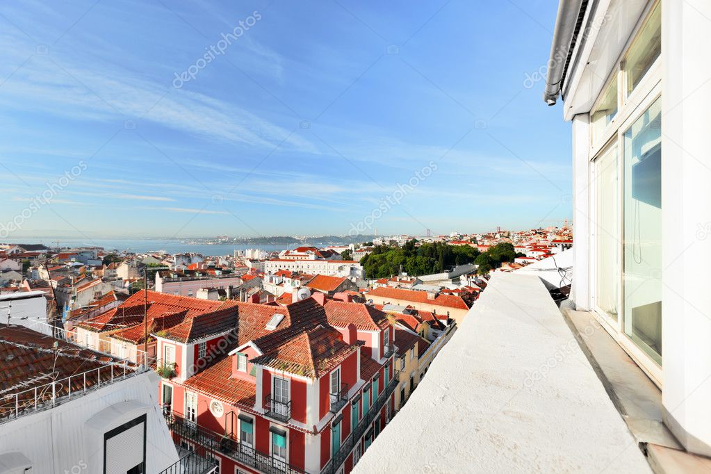 Window view to roofs of Lisbon