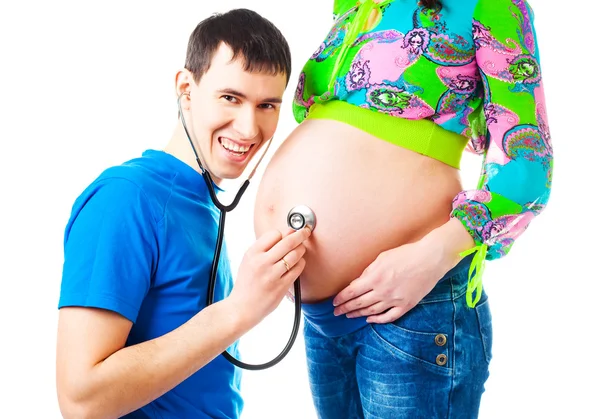 Father listening to the baby — Stock Photo, Image