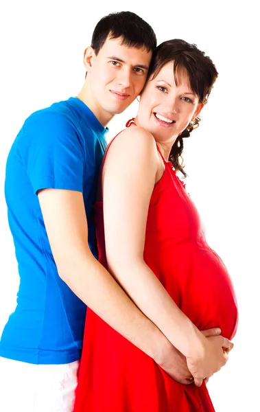 妊娠中の女性と夫 ロイヤリティフリーのストック画像