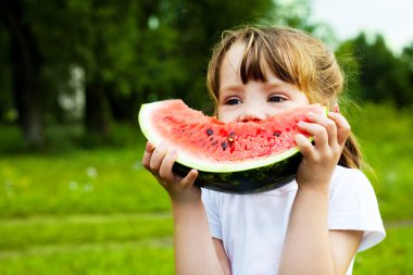 Girl eating watermelon clipart