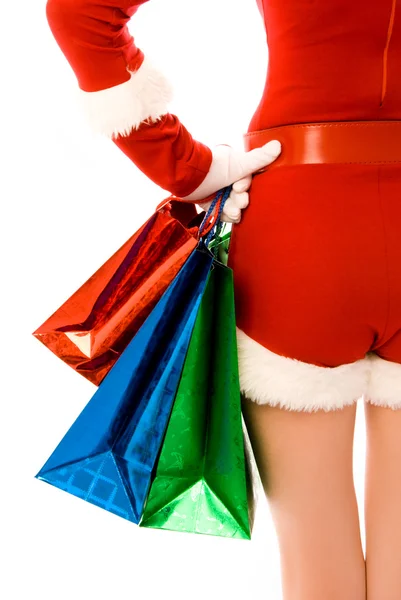 Menina vestida de Papai Noel com presentes de Natal — Fotografia de Stock